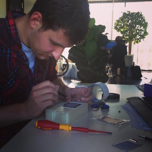 getdisplio's tweet photo. Displio co-founder Raivis putting together a #DISPLIO device. A few more tests and it'll be ready for production! http://t.co/xfXdp40Dr3