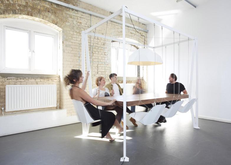 dezeen's tweet photo. Meetings might be more fun at this boardroom table with hanging chairs: http://t.co/JnnMatQnOx #design http://t.co/uX6CftZ1zZ