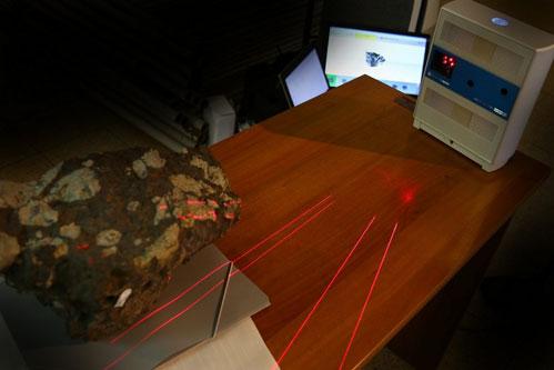 nextengine's tweet image. Uni Helsinki Tomas Kohout measuring big Chelyabinsk plus smaller #meteorite for #3dmodeling tinyurl.com/os7xjv4