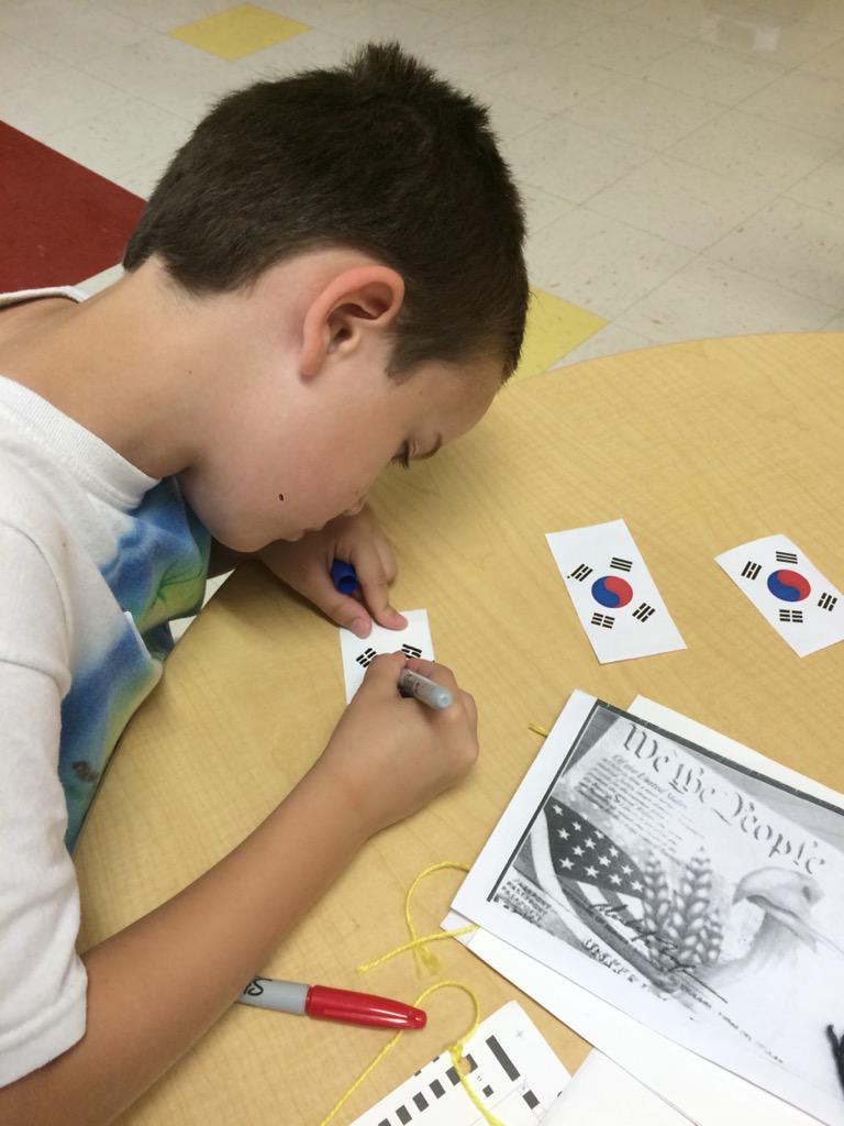 SLPKidsPlace's tweet photo. Shrinky Dinks!  We drew the South Korea flag on special plastic, heated it up, and watched it shrink. http://t.co/qhGMkNdh0f