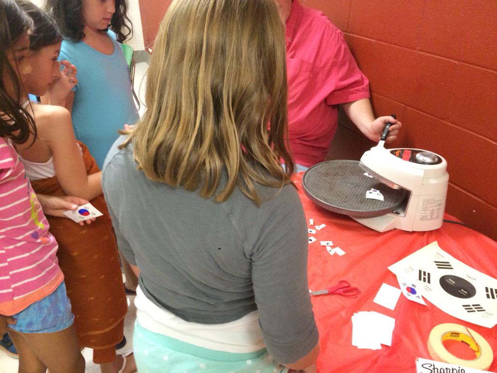 SLPKidsPlace's tweet photo. Shrinky Dinks!  We drew the South Korea flag on special plastic, heated it up, and watched it shrink. http://t.co/qhGMkNdh0f