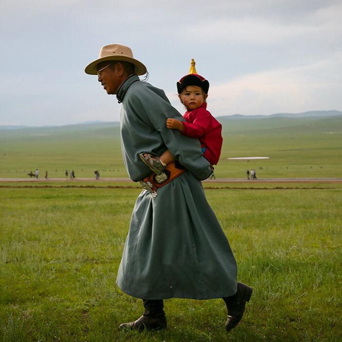 OneWorldOneYear's tweet image. A young child in traditional costume at the Naadam Festival outside of Ulan Bator in Mongolia. #mongolia #tbt