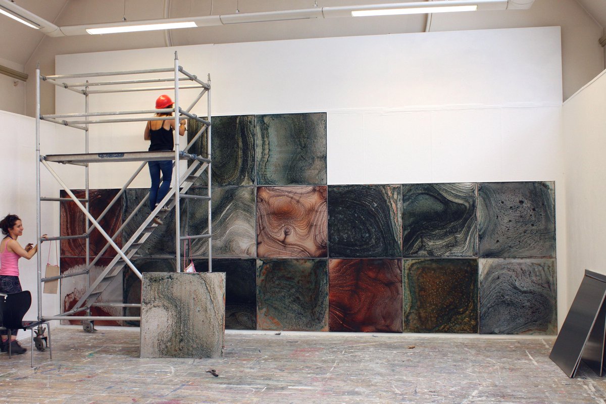 EYETOTHESUMMIT's tweet photo. @lucymandrews3 installing her wall of evaporated water trays for #EYETOTHESUMMIT!  @ArtBasedMasters @_artmap @BM_AG http://t.co/e9HxQNOJ1H