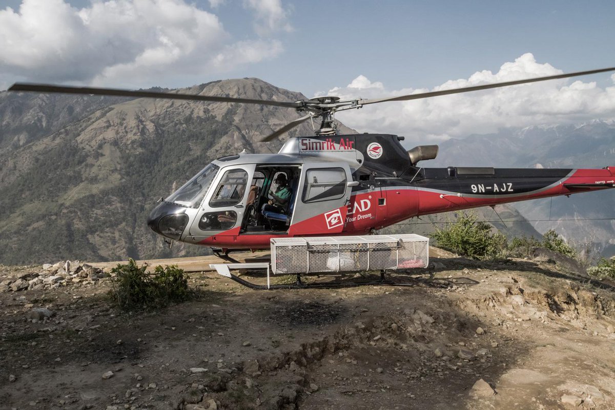 just_chen's tweet photo. The rescue chopper is here! #NepalEarthquake #ShareHumanity http://t.co/IvmhF8SfrK http://t.co/EUsAYQWrrI