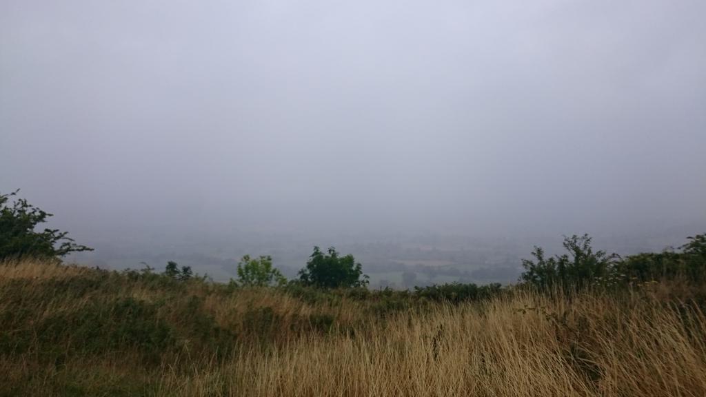 AnalogueAndy's tweet photo. #CotswoldWay A super steep climb up to #CamDown where the "superb" view is now shrouded by the clouds (it's raining) http://t.co/ibkrf5iQqz