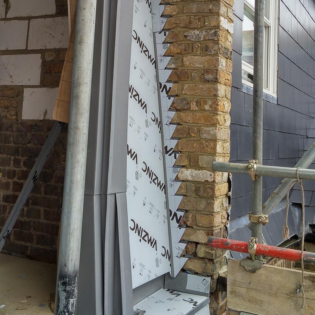 bellzinc's tweet image. Nice bit of zinc in dulwich.vertical cladding. And, wrapped around a qwerky angled dormer! #notlevel #zincroofing