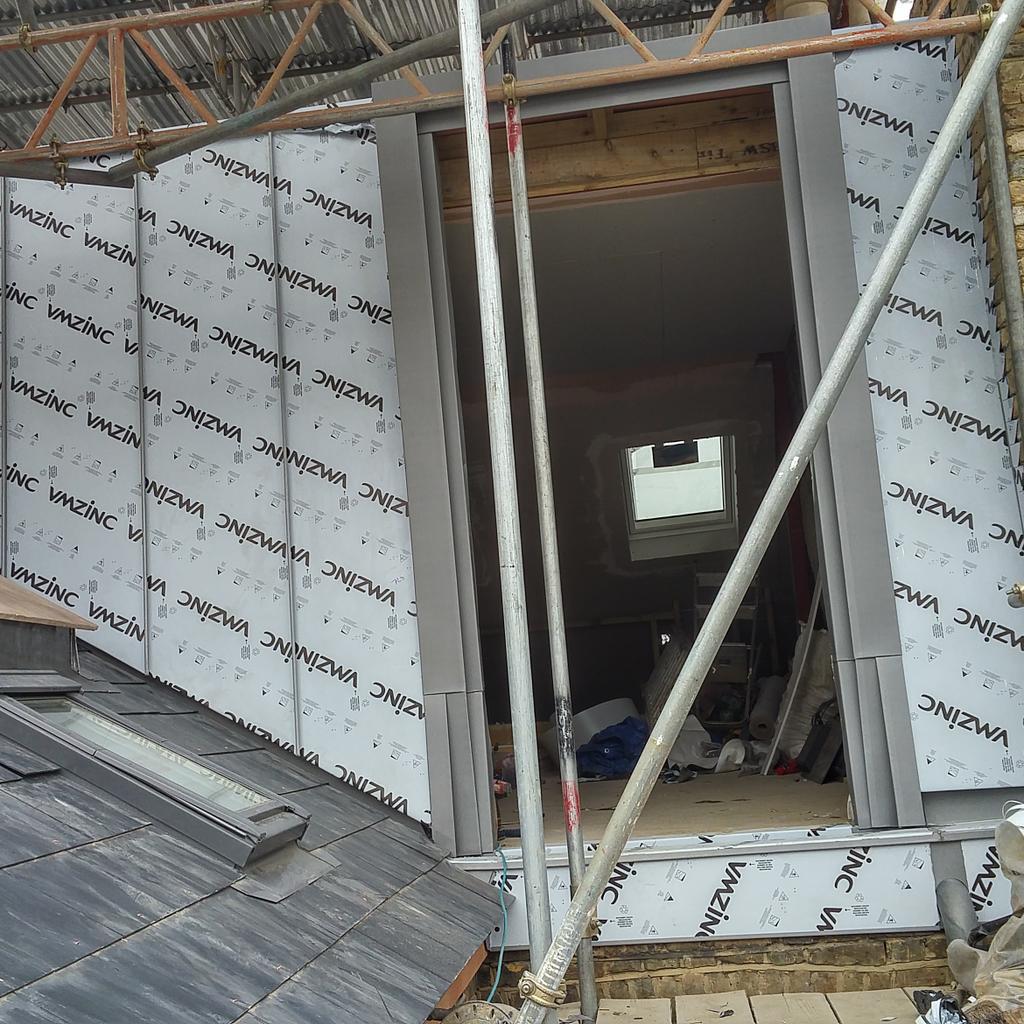 bellzinc's tweet image. Nice bit of zinc in dulwich.vertical cladding. And, wrapped around a qwerky angled dormer! #notlevel #zincroofing