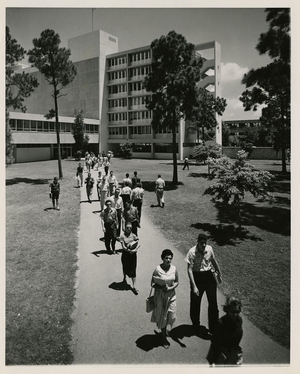 UMAdmission's tweet image. #TBT - circa 1950, students walking by the Ashe Memorial Administration Building.
