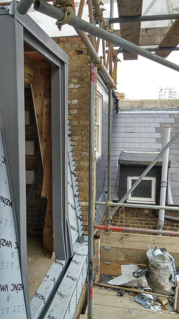 bellzinc's tweet image. Nice bit of zinc in dulwich.vertical cladding. And, wrapped around a qwerky angled dormer! #notlevel #zincroofing