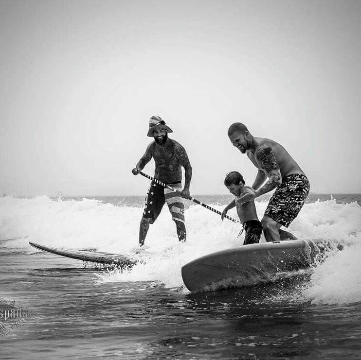 Start them young! Sutter and his boy.