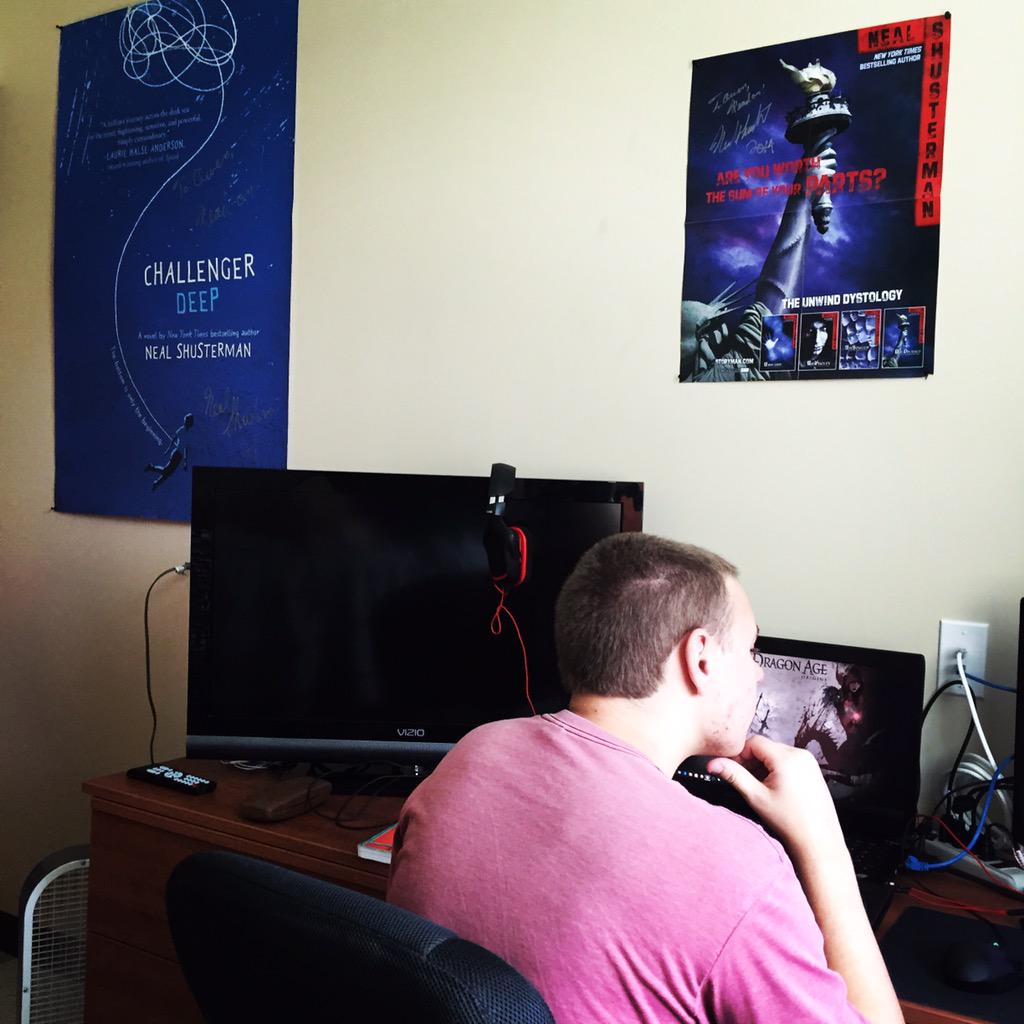imthelibrarian's tweet photo. My son took his signed author book cover posters with him to @UT_Dallas. Here is @NealShusterman wall. #nerdlevel? http://t.co/f4KxtAm51a