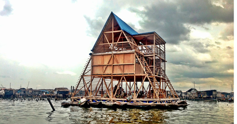 _smithjournal's tweet photo. A floating school in Nigeria poses one way of adapting to climate change. http://t.co/krg1jQoKBf http://t.co/H0mtEEW856