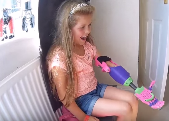 TechCrunch's tweet photo. Watch 8-year-old Isabella unpack a new 3-D printed arm http://t.co/Z1qsSG9rIB http://t.co/cw3SrbX1JR