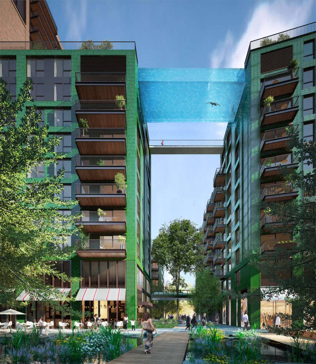 TravelMagazine's tweet photo. This transparent bottom swimming pool 115 feet (35m) in the air can't be real?! Find out: http://t.co/uOT7qkBt7h http://t.co/ui1Ti3i6L0