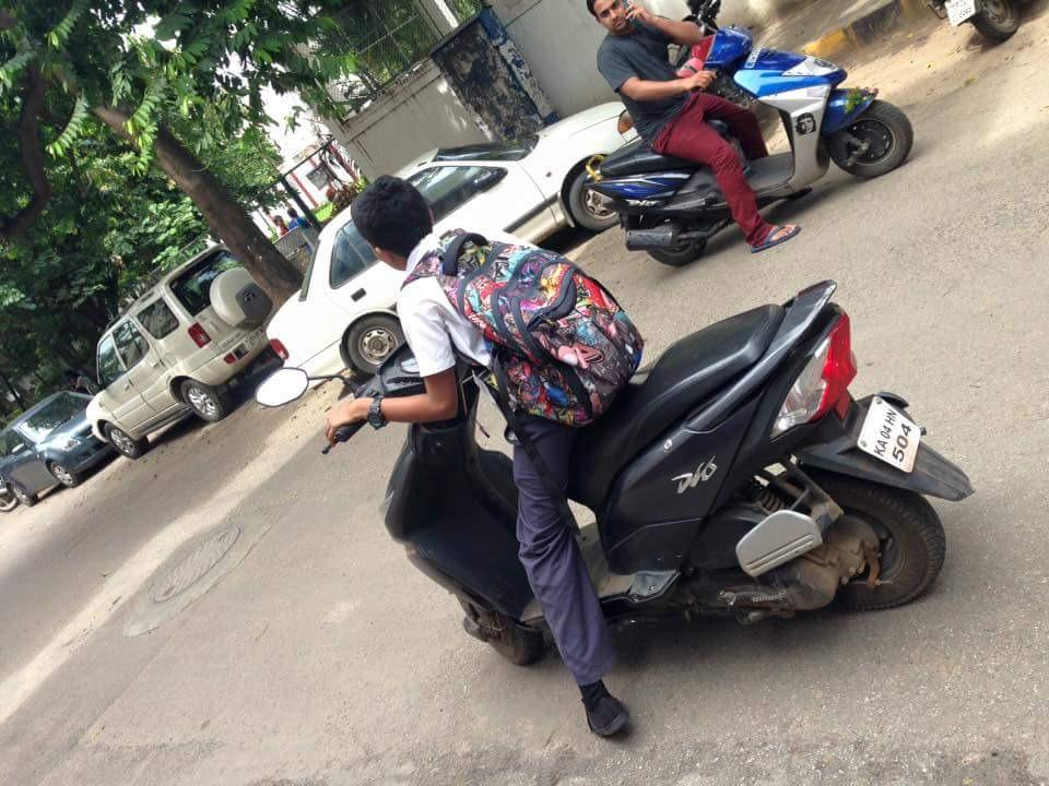 vineeth7710's tweet photo. @blrcitytraffic 
School student riding 
Place 11th crossMalleshwaram 21:8:15
Regn ka04 hn 504
expect any action ? http://t.co/MBhgWgXDQg