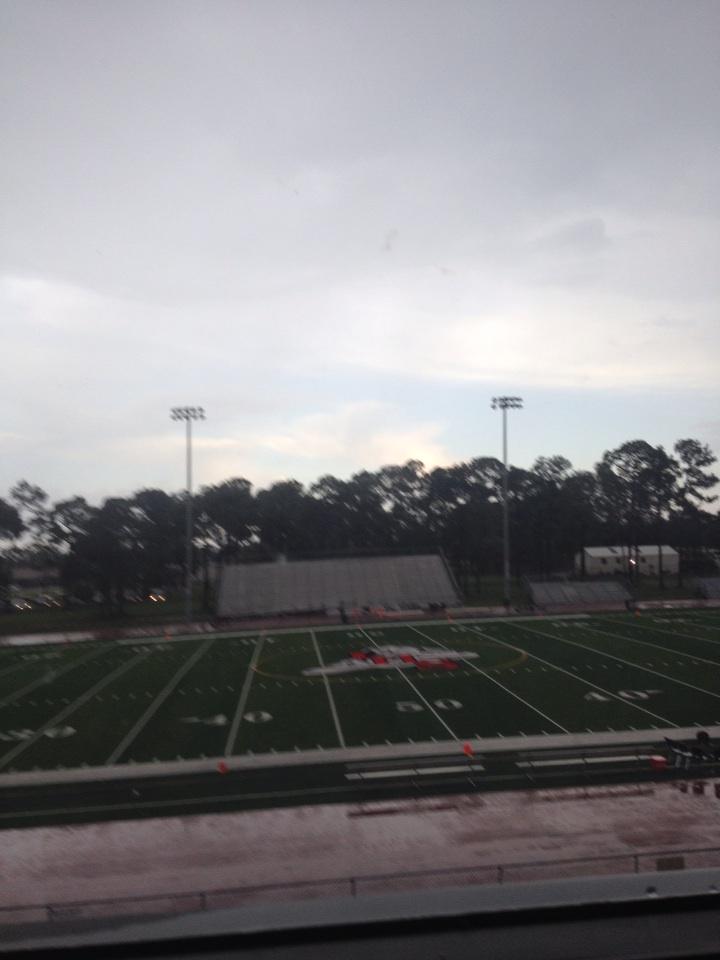 View from press box in Immokakee. Still sitting out lightning delay. No fans in stadium yet. #ndnhsfb