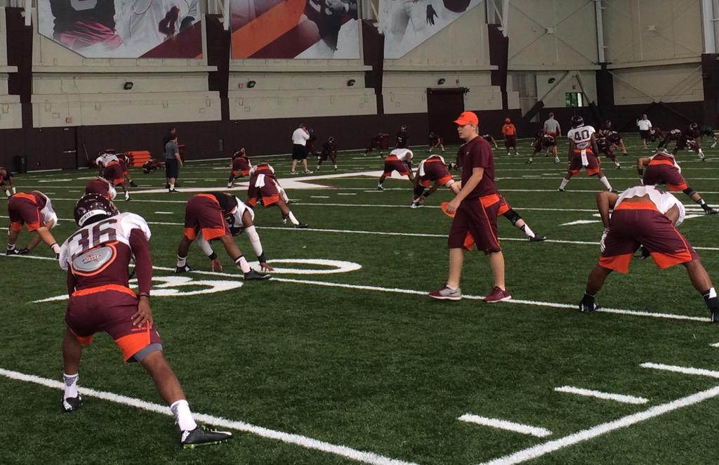 HokiesFB's tweet image. Coach Gentry getting us loosened up &amp;amp; ready to go! 

#VTCampLife 💼