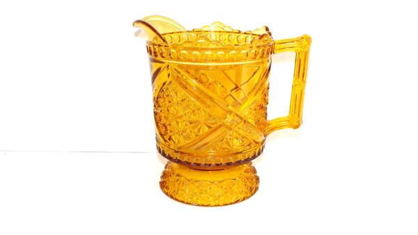 EtagereAntiques's tweet photo. #DaisyButton Crossbars #Amber Glass Milk Pitcher Richards Hartley #Mikado #EAPG http://t.co/yB938GCETi #gotvintage http://t.co/fd9QIlUu0b