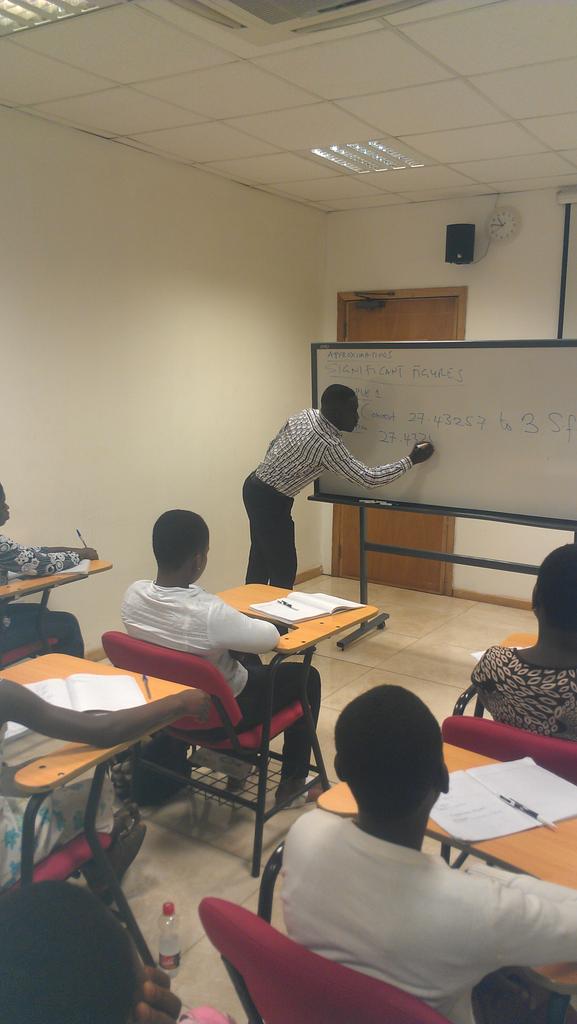 GirlsEdGH's tweet photo. @yawson_nelson teaching significant figures #mathsisjoy #vacationclasses #geiglearns @LancasterGhana @VedicGh http://t.co/FRsrlCAD82