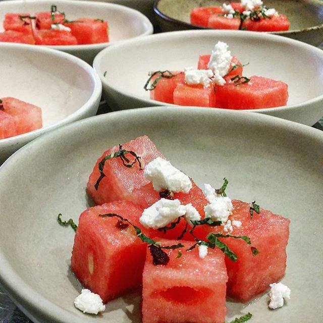Watermelon, feta, mint, and dehydrated black olive, olive oil.