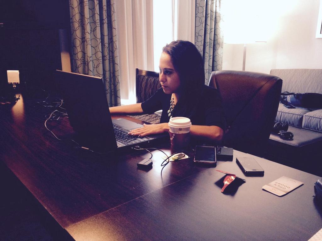 MCastroReports's tweet photo. My photog @isaiah_e took this photo of me while I was in the zone trying to make deadline. #reportermode http://t.co/b1zWx9dymn