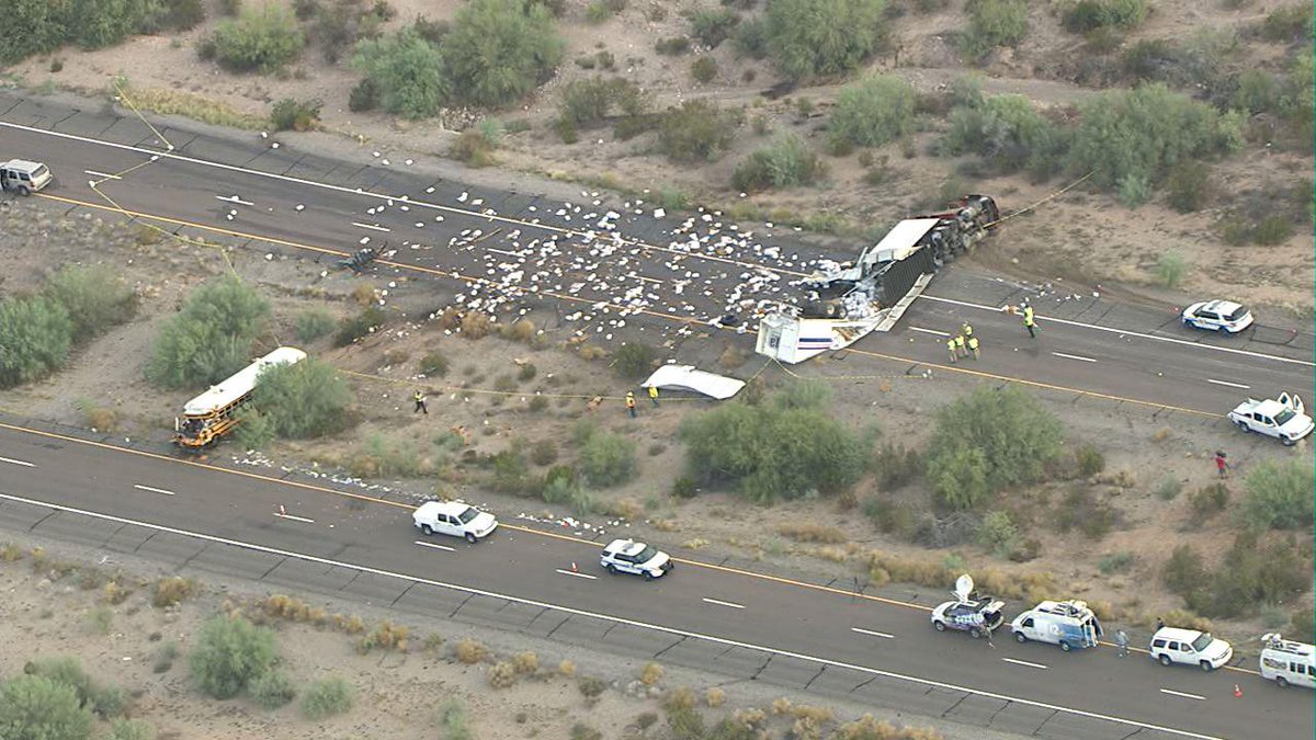 Arizona prison bus crashes as inmates tend to injured and direct