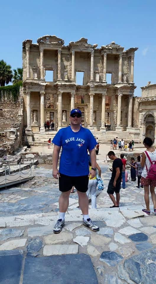 defiantalpha's tweet image. LS Reilly of HMCS WINNIPEG at the old ruins in Turkey.  Showing #BlueJays  pride.

#TDTuesday