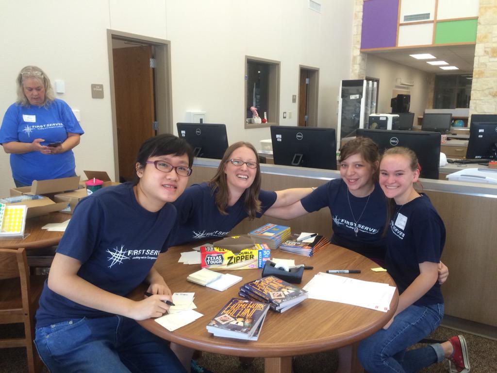 NBottlinger's tweet photo. We love our friends at First Baptist Church! Thanks for helping to set up our beautiful new library😊 http://t.co/yreJArAjy3