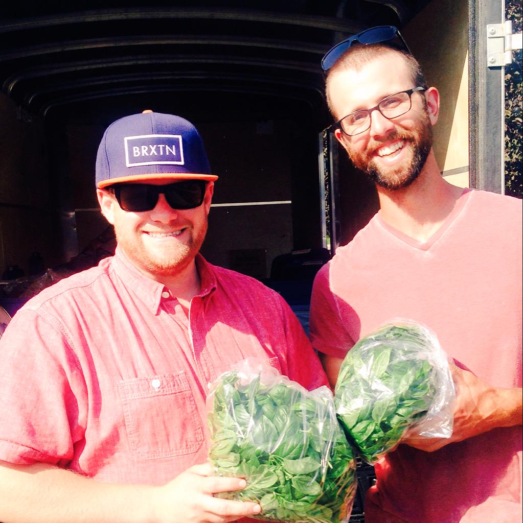 CheddaHeads's tweet photo. Just two guys wearing pink shirts holding fresh basil! thank You Mike for your Commitment and Passion @SteelPonyFarm http://t.co/I0lgzjpVtU