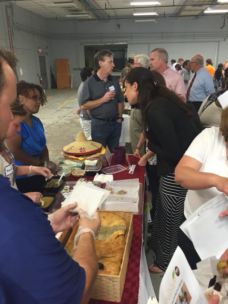 MassInno's tweet photo. People are lining up to try @AdeyFoods authentic, sustainable Ethiopian food! It's awesome! #MINFoodie9 http://t.co/P1cLZASkfW