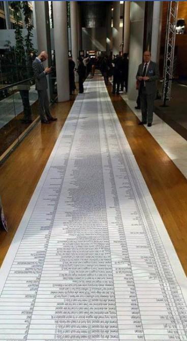 The names of 17,306 people who have drowned crossing the Mediterranean laid out at entrance of European Parliament