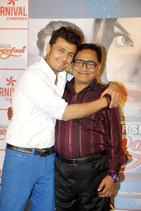 Writermahi's tweet photo. Picture Perfect: @sonunigam with his father #AgamKumarNigam during launch of #AgamKumar's 6th album #PhirSeBewafaai http://t.co/tWsRm6L9Fq