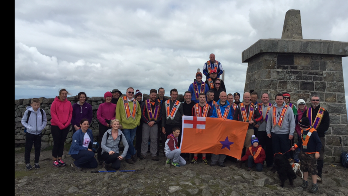 OrangeOrder's tweet photo. Congratulations to members of Banbridge District and friends who recently climbed to the summit of Slieve Donard http://t.co/tW3INOdDa3