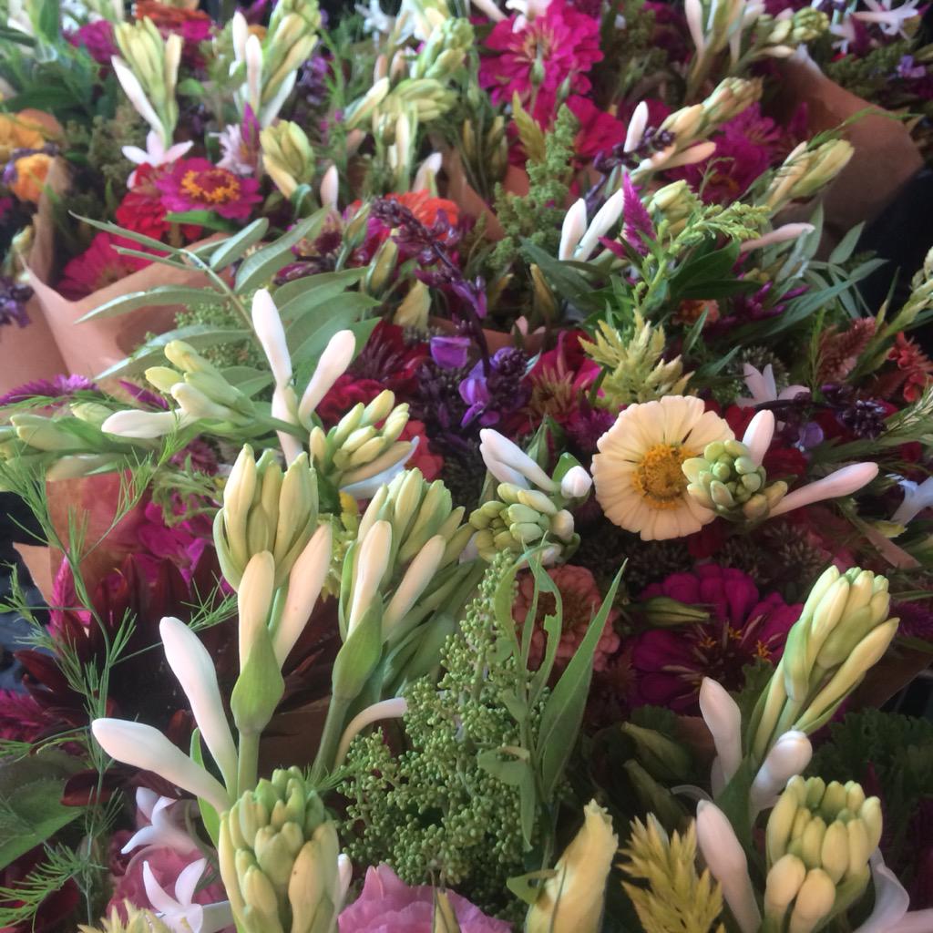 SassafrasFork's tweet photo. A feast for the senses.  Mixed bouquets @wholefoods_drh topped with tuberoses and scented geranium! http://t.co/OOIZgrXZ9y