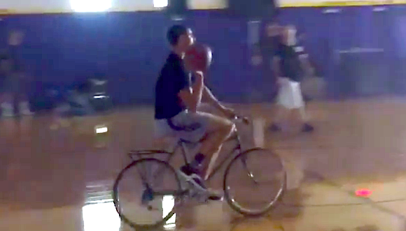 SFGate's tweet photo. Warriors guard Klay Thompson is a great shooter, but how is he at half-court on a bike? http://t.co/UK3mjWrzYq http://t.co/RdJsBm4khd