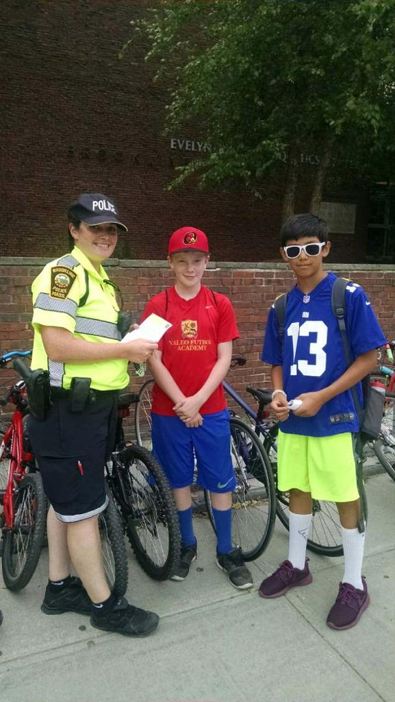 BrooklineMAPD's tweet photo. Ice-cream tickets given to these boys. Caught red handed locking up their bikes and helmets. #ridesafely http://t.co/1ymgLfeXsA