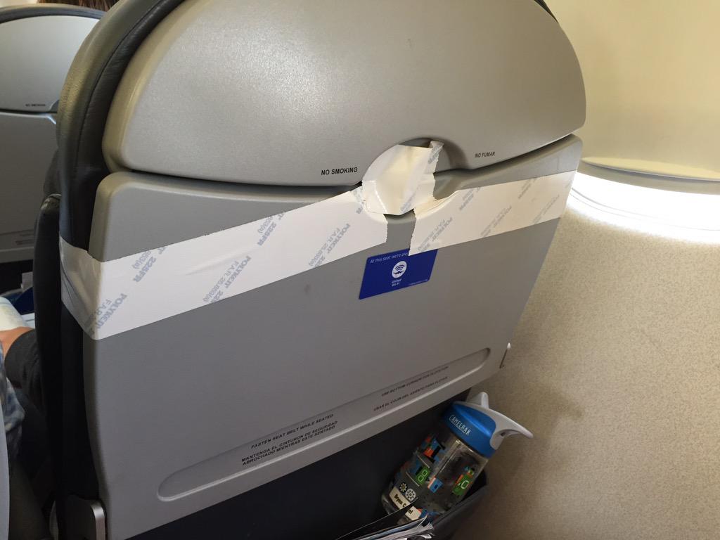 bcanel's tweet photo. Great fix republic dba @united. Delay the flight and tape it shut. http://t.co/Sq72gWrBqP