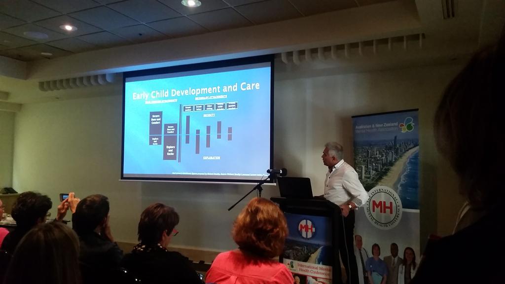 JohnTouissant: Parents play 2 attachment roles w/ 2 functions - secure base AND excitement&amp;play #IMH15 #attachment