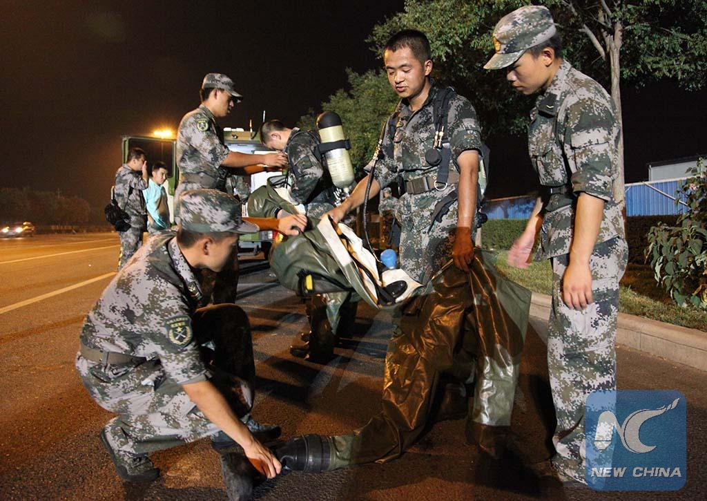 XHNews's tweet image. Album: Soldiers and policemen work at Tianjin blast site.A 19-year-old survivor rescued early morning