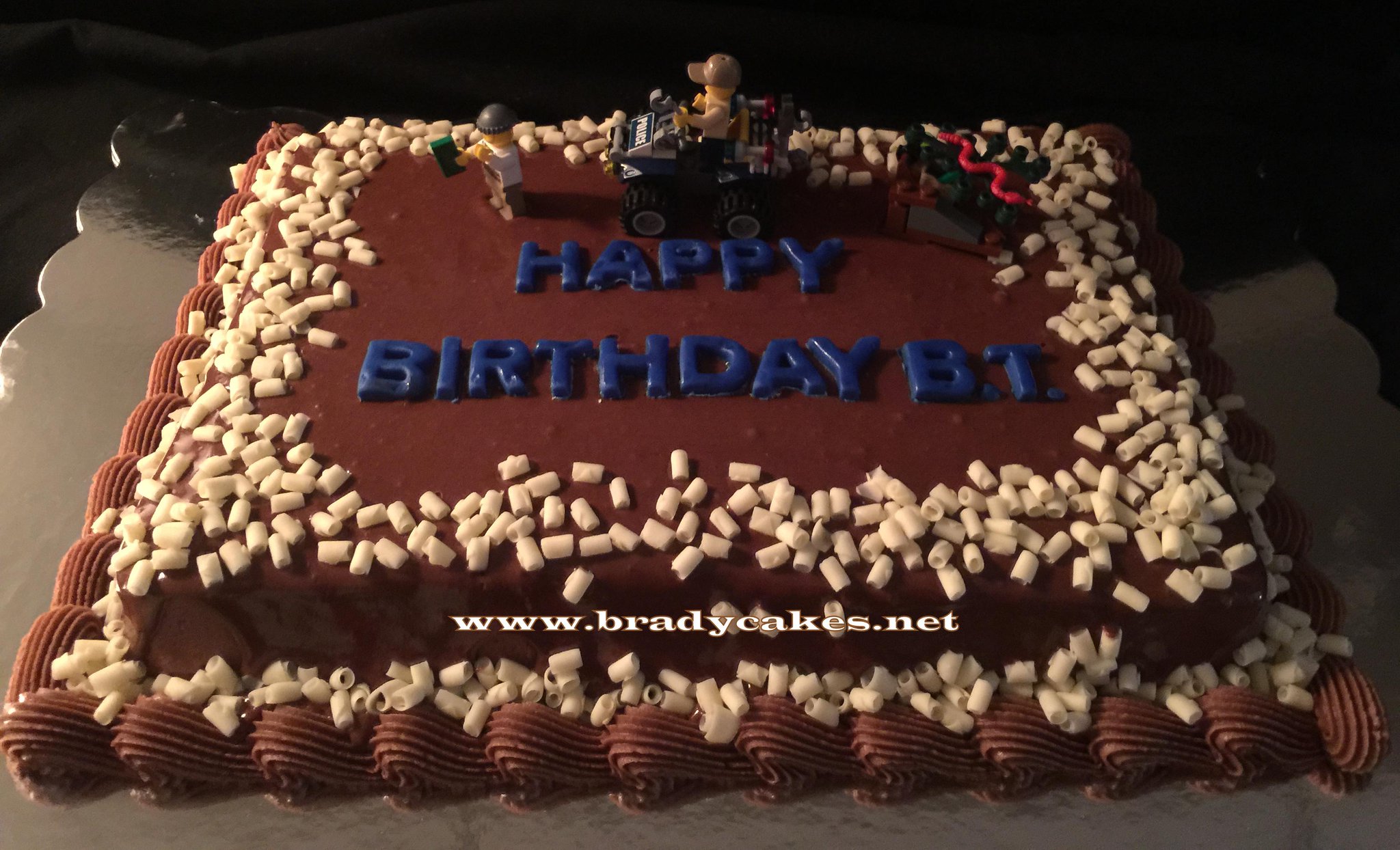 Chocolate on Chocolate Ganache with White Chocolate Curls
\"Happy Birthday \Lil B.T.\" - Lego Movie Theme
Brady Cakes 