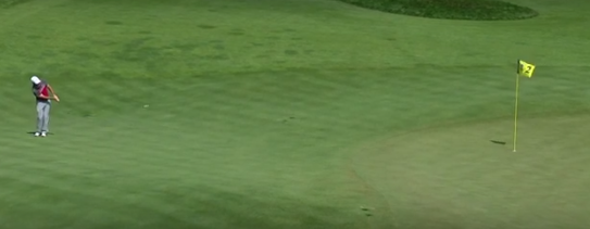 GolfChannel's tweet image. Where's an eagle emoji when you need it? Watch Rory's chip-in at the par-5 2nd: bit.ly/1EstE31