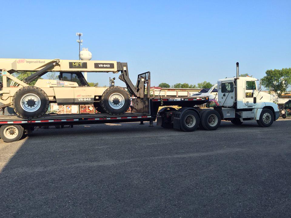 Sometimes you need bigger equipment in order to move the big equipment. On to the next commercial roofing gig!