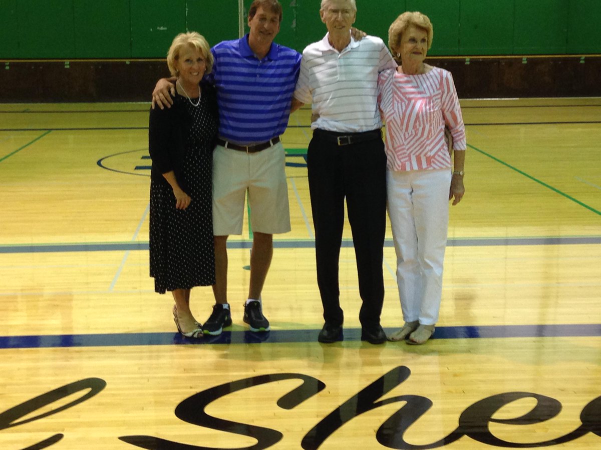 Dr. Linda Yonke, Rick Malnati and  Mel and Margaret Sheets celebrate at "Mel Sheets Court" unveiling. #gotrevs