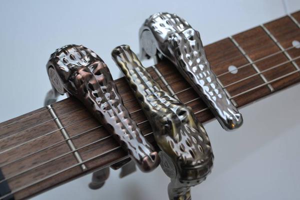 PlecPicker's tweet image. Please Retweet. Do You Want To Win A Crocodile Guitar Capo? Go To Facebook.com/PlecPicker To Snap Em Up.