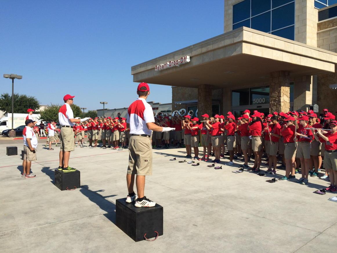 Dat1Teacher's tweet photo. @mbhsbroncoband performs at First Choice grand opening. Go Broncos! http://t.co/D1APgroFXo