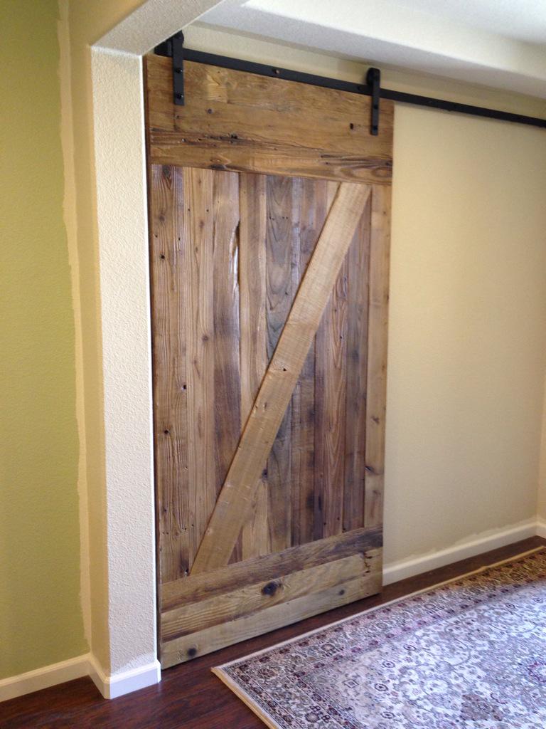 A true #home #miracle is to build with thought for the future while creating a barrier for peace and quiet. #barndoor