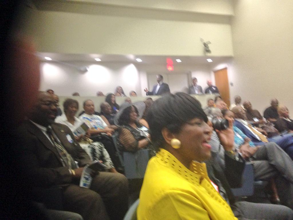 Everyone applauding Maxine Waters on her birthday & singing happy b-day. 