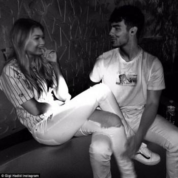 Gigi Hadid wishes Joe Jonas a happy 26th birthday as she shares photo of the pair cuddled up 