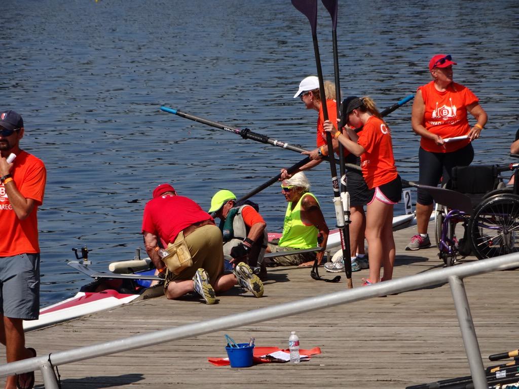 BAYADAHHC's tweet photo. Crew members &amp; volunteers help the rowers prepare for their launch #BAYADAregatta http://t.co/4hZXHySZCu