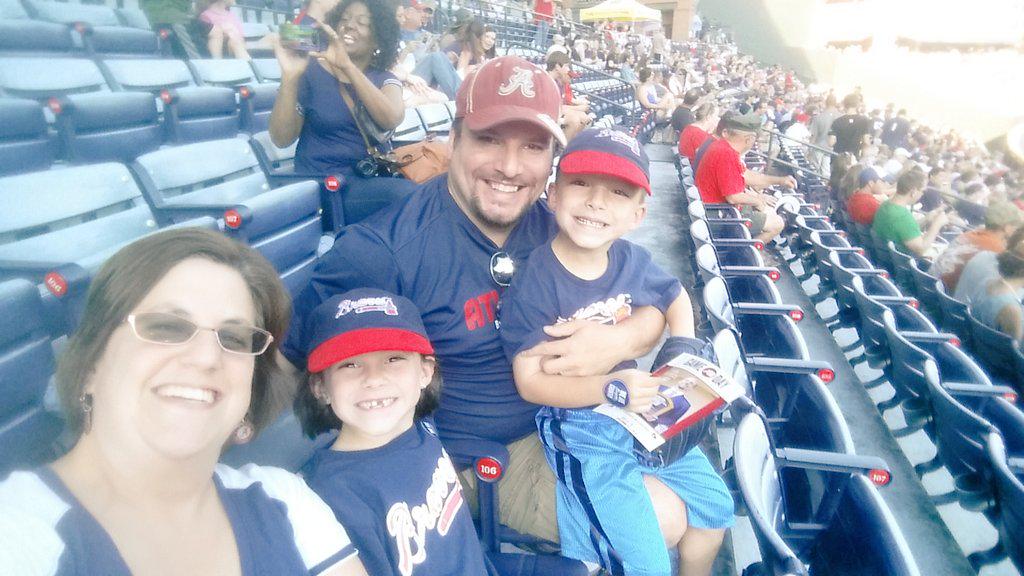 jminga76's tweet photo. The Mitchell family enjoying the game. #BRAVESUSA http://t.co/n4xhiUfc2q